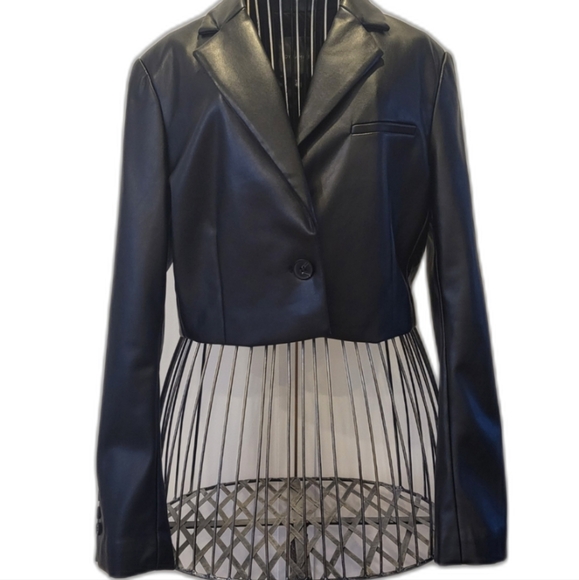 Dynamite, small black faux like leather. - Picture 2 of 8